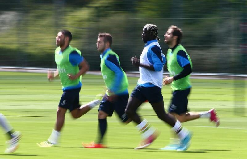 Bacary Sagna of Arsenal in action during a training session on Wednesday ahead of the FA Cup final. Clive Mason / Getty Images / May 14, 2014
