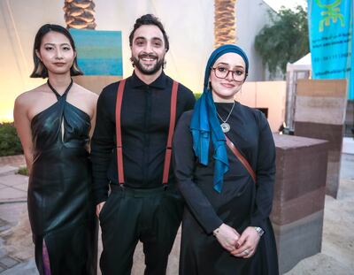Vivi Zhu, left, Majd Alloush and Hala El Abora are this year's Christo and Jeanne-Claude Award winners. Victor Besa / The National