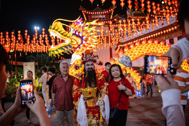 The God of Wealth attends a Lunar New Year celebration at Thean Hou Temple in Kuala Lumpur, Malaysia. Getty Images