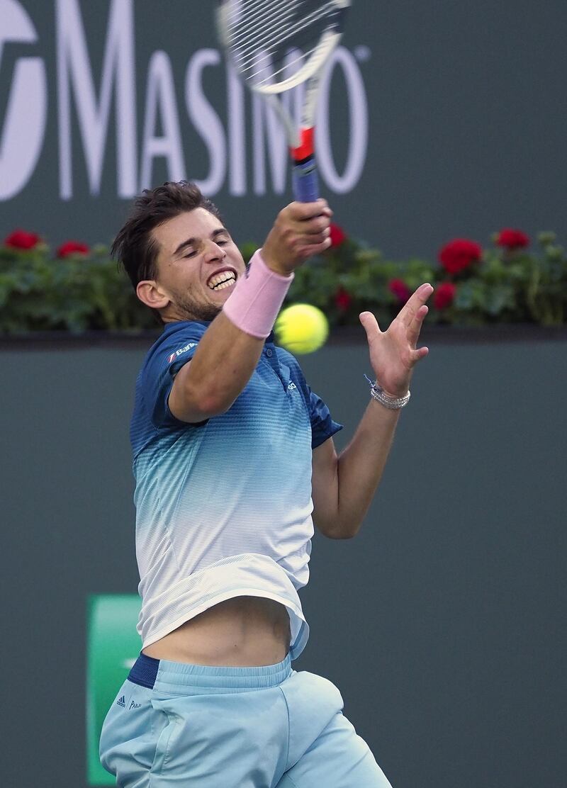 Dominic Thiem in action against Roger Federer.EPA