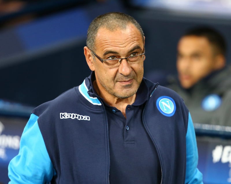 FILE - In this Oct. 17, 2017, file photo, Napoli coach Maurizio Sarri arrives prior to the start of the Champions League group F soccer match between Manchester City and Napoli at the Etihad Stadium in Manchester, England. Chelsea has hired Maurizio Sarri as its manager on a three-year contract. The announcement was made on Saturday, July 14, 2018. (AP Photo/Dave Thompson, File)