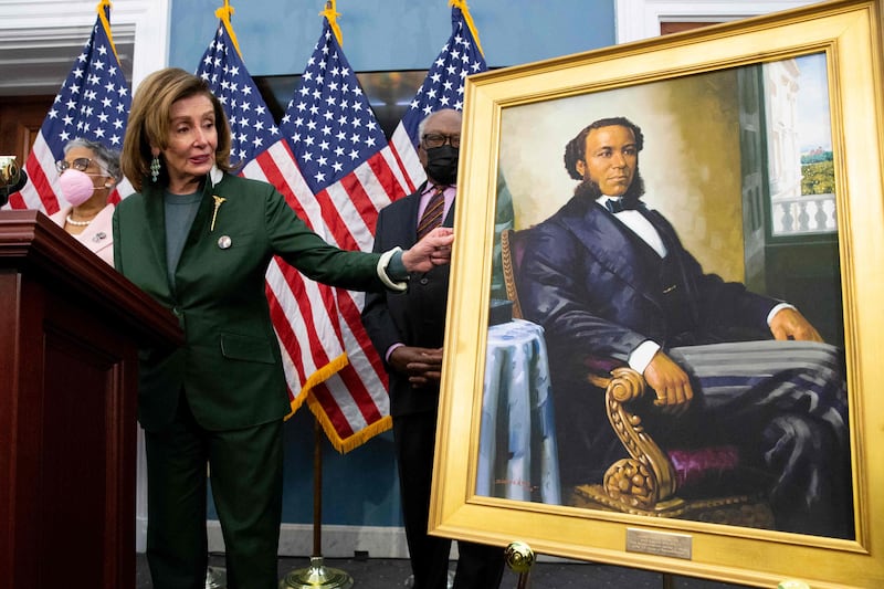 Former speaker Nancy Pelosi at the unveiling ceremony for the Joseph H Rainey Room on Capitol Hill in Washington. Rainey was the first black person to serve in the US House. AFP