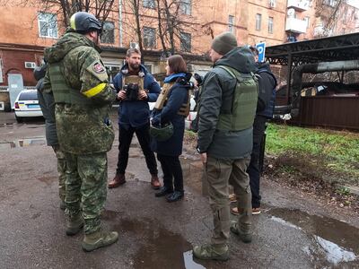 Global rights compliances investigators with police in Ukraine. Photo: Global Rights Compliance