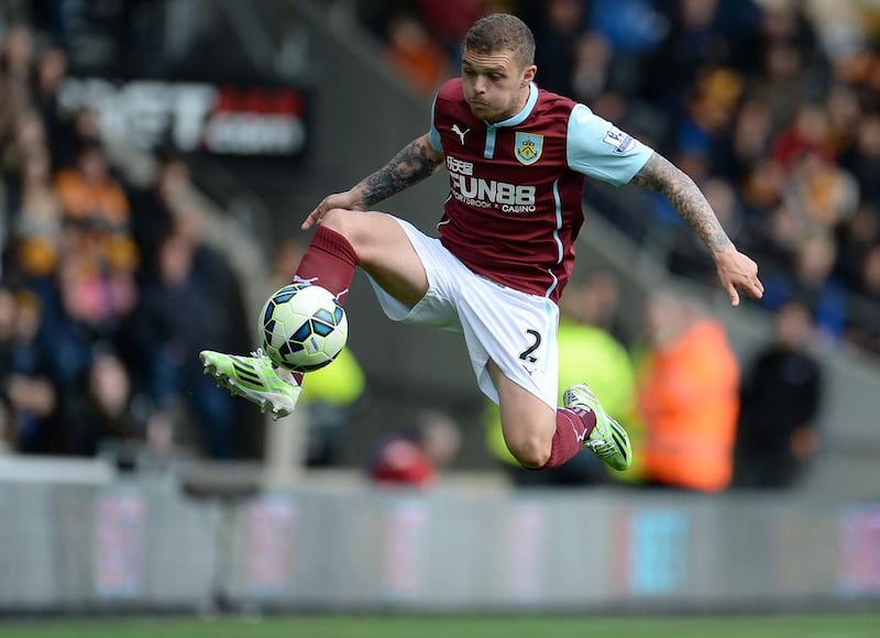 Burnley defender Kieran Trippier jumps to control the ball during the Premier League match against Hull City at the KC Stadium in Kingston upon Hull, England on May 9, 2015. Oli Scarff / AFP