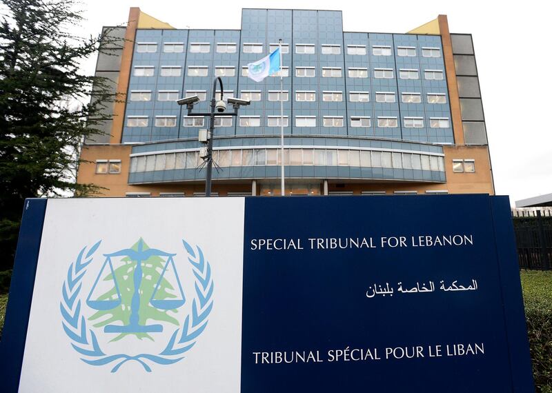 FILE - This Jan. 16, 2014, file photo, shows an exterior view of the Special Tribunal for Lebanon, in Leidschendam, Netherlands. The Tribunal, a U.N.-backed court based in the Netherlands, on Monday, Sept. 16, 2019, filed new charges including terrorism and intentional homicide against a Hezbollah fighter who also is accused of assassinating former Lebanese Prime Minister Rafiq Hariri. The Tribunal announced that a judge has confirmed a new five-count indictment accusing Salim Jamil Ayyash of three bombings targeting Lebanese politicians in 2004 and 2005. (Toussaint Kluiter/Pool, File)