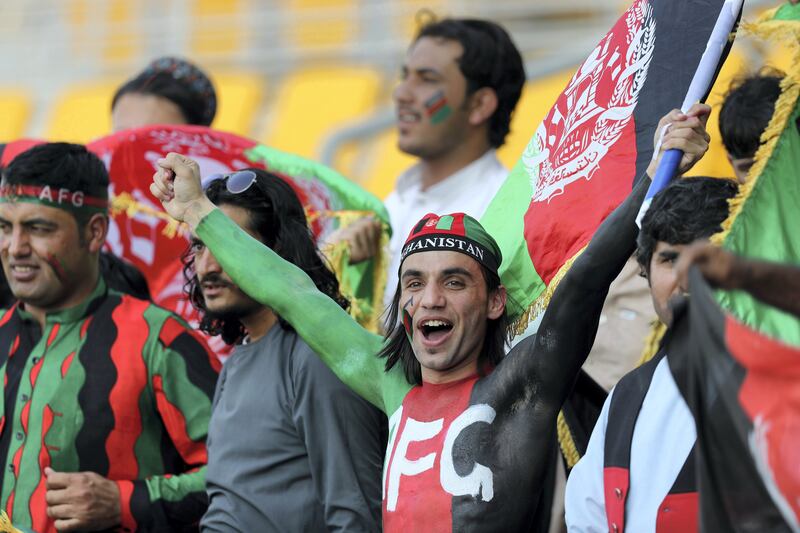 Abu Dhabi, United Arab Emirates - September 20, 2018: Afghanistan fans before the game between Bangladesh and Afghanistan in the Asia cup. Th, September 20th, 2018 at Zayed Cricket Stadium, Abu Dhabi. Chris Whiteoak / The National