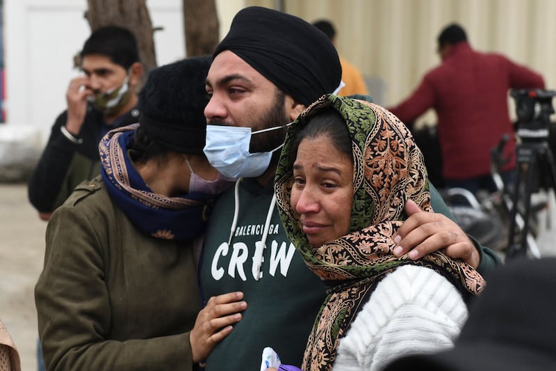 Relatives mourn near the coffin of Hardeep Singh, who was killed in the January 17 drone attack in Abu Dhabi. All photos: AFP