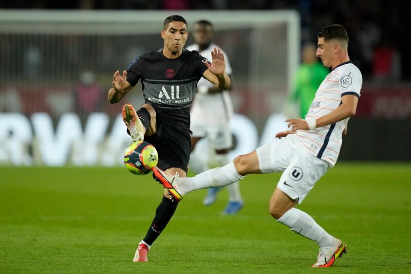 Achraf Hakimi - 6, It took the Moroccan about 20 seconds to make his first burst forward. Was effective whenever he did step up in the first half, while also defending well. Had some sloppy moments early in the second period but should have had an assist after playing Kylian Mbappe through. AP Photo