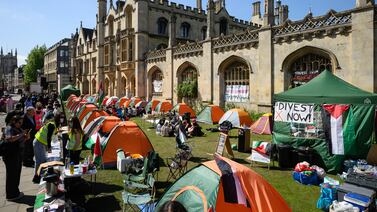 Protesters hold a group discussion at the pro-Palestinian camp outside King's College on May 8 in Cambridge, England. Getty Images