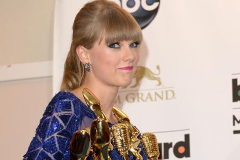 Swift won eight of 11 awards, including top artist and top Billboard 200 album for Red. Jason Merritt / Getty Images / AFP