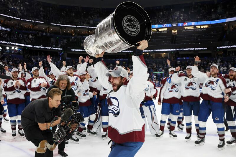 Andrew Cogliano of the Colorado Avalanche lifts the Stanley Cup. AFP
