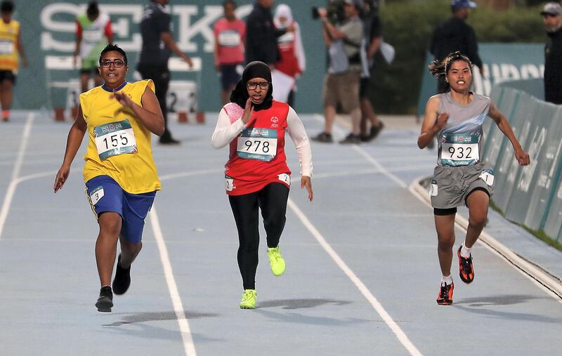 DUBAI , UNITED ARAB EMIRATES , March 18 – 2019 :- Reem Alblooshi athlete from UAE (978 center) participating in the 100m run at the Special Olympic games held at Dubai Police Stadium in Dubai. ( Pawan Singh / The National ) For News. Story by Ramola