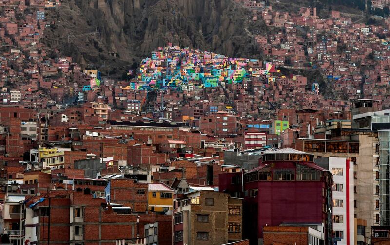 General view of the Chualluma neighborhood in La Paz, amid the new coronavirus pandemic. The multi-coloured neighborhood of Chualluma patiently waits for the new coronavirus pandemic to pass and tourists to arrive. AFP