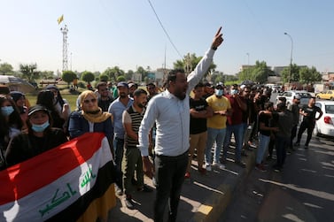 Iraqi unemployed graduates chant slogans during a demonstration near the green zone in central Baghdad, Iraq on 21 October 2020. EPA