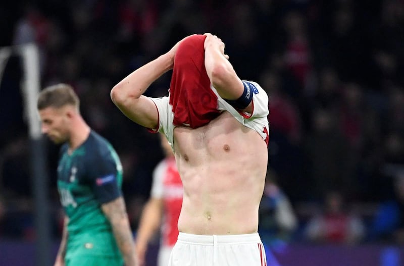 Ajax's Matthijs de Ligt looks dejected at the end of the match. Reuters