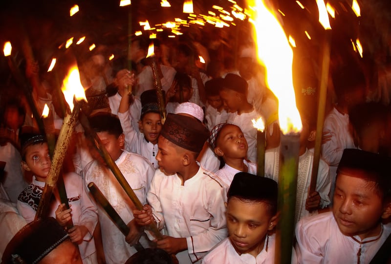 Indonesian children welcome Laylat Al Qadr in Ternate, North Maluku. AFP