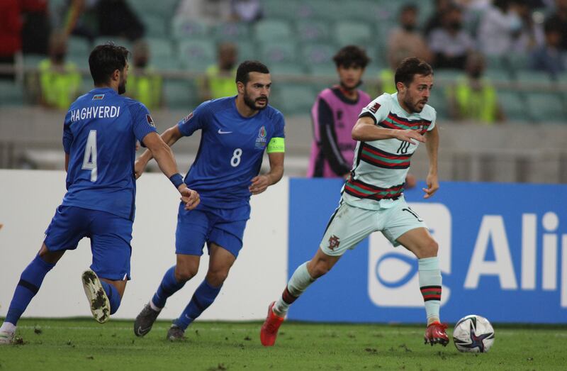 Portugal's Bernardo Silva, right, in action during the World Cup 2022 Group A qualifying match against Azerbaijan at the Olympic Stadium in Baku. AP