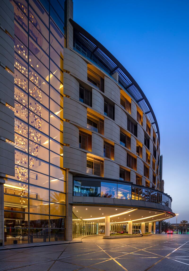 The exterior of the hotel at night