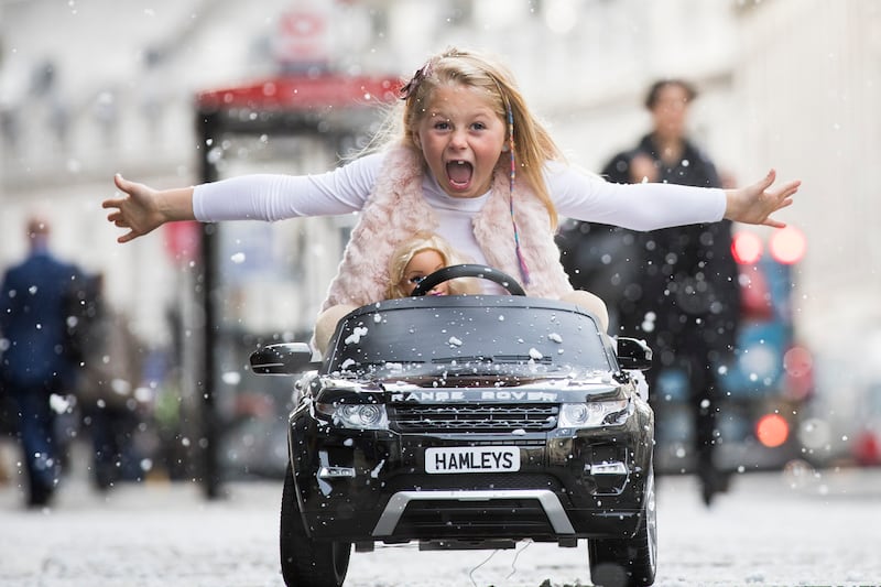 A Range Rover Evoque ride-on electric car on Regents Street as Hamley's announces it's top 10 toys for Christmas in 2017