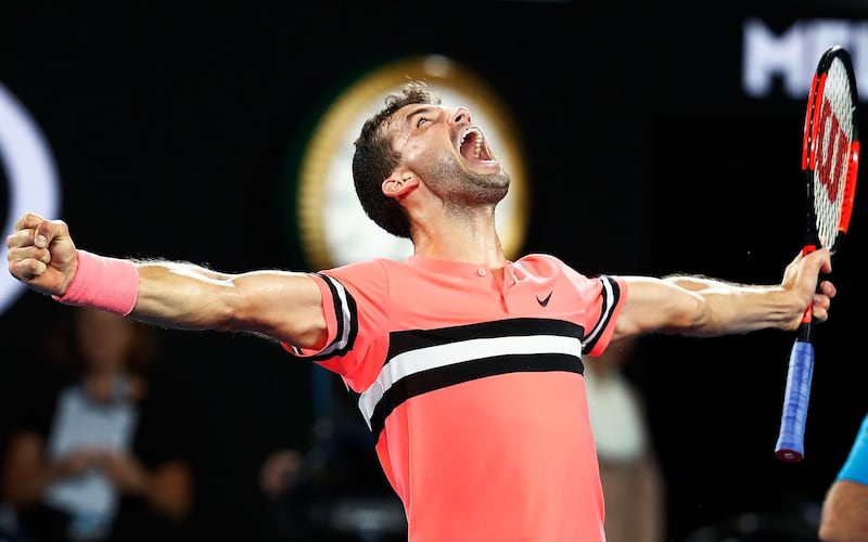 MELBOURNE, AUSTRALIA - JANUARY 21:  Grigor Dimitrov of Bulgaria celebrates winning in his fourth round match against Nick Kyrgios of Australia on day seven of the 2018 Australian Open at Melbourne Park on January 21, 2018 in Melbourne, Australia.  (Photo by Michael Dodge/Getty Images)