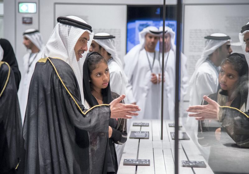 SAADIYAT ISLAND, ABU DHABI, UNITED ARAB EMIRATES - November 08, 2017: HH Sheikh Abdullah bin Zayed Al Nahyan, UAE Minister of Foreign Affairs and International Cooperation (L) and HH Sheikha Fatima bint Abdullah bin Zayed Al Nahyan (R), tour the LouvreAD.
( Omar Al Askar for Crown Prince Court - Abu Dhabi )
---