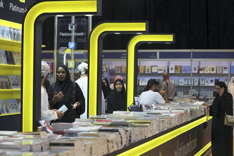 ABU DHABI,  UNITED ARAB EMIRATES , April 24 – 2019 :- Visitors browsing books at the Abu Dhabi International Book Fair held at Abu Dhabi National Exhibition Centre in Abu Dhabi. ( Pawan Singh / The National ) For News/Online/Instagram. Story by Rupert