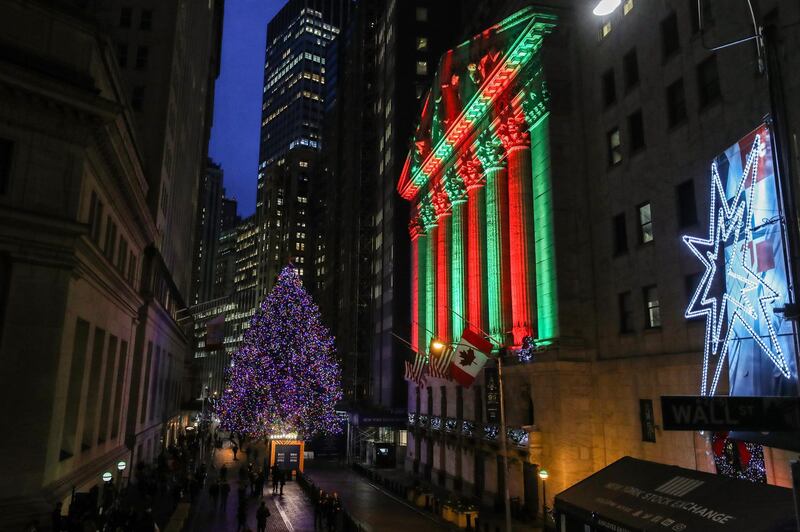 NEW YORK, USA - DECEMBER 14 : The New York Stock Exchange (NYSE) and a Christmas tree are illuminated in New York City, United States on December 14, 2018. (Photo by Atilgan Ozdil/Anadolu Agency/Getty Images)