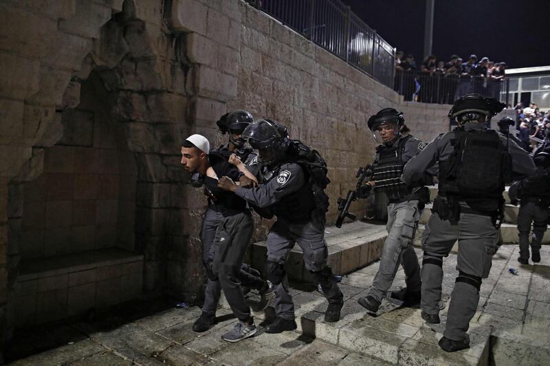 Israeli security forces detain a Palestinian protester outside the Damascus Gate on April 29, 2021. AFP