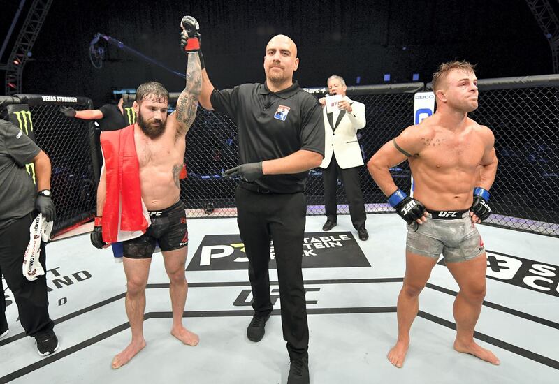 ABU DHABI, UNITED ARAB EMIRATES - JULY 16: Jimmie Rivera celebrates after his decision victory over Cody Stamann in their featherweight fight during the UFC Fight Night event inside Flash Forum on UFC Fight Island on July 16, 2020 in Yas Island, Abu Dhabi, United Arab Emirates. (Photo by Jeff Bottari/Zuffa LLC via Getty Images)
