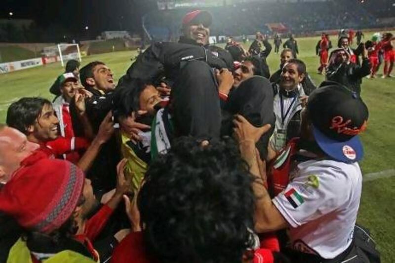 Mahdi Ali, seen here celebrating the UAE football team's Olympic qualification in Tashkent earlier this year, calls the Under 23 team 'family'. Sammy Dallal / The National