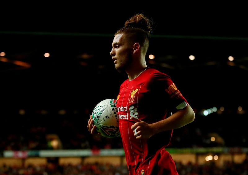 Harvey Elliott, 16, became the youngest player to start for Liverpool in a competitive match in the 2-0 win over MK Dons. EPA