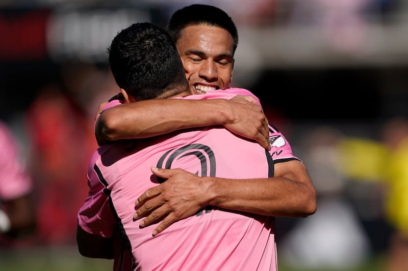 Inter Miami midfielder Diego Gomez, right, and striker Luis Suarez celebrate a goal. AP