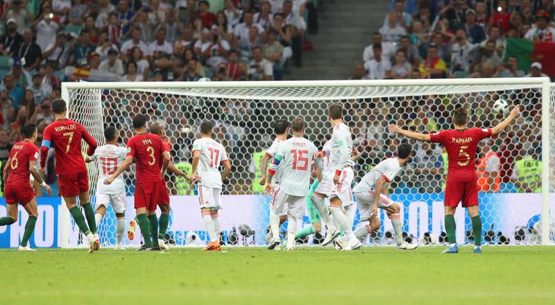 Match 4: Cristiano Ronaldo converts a free kick for Portugal against Spain. EPA