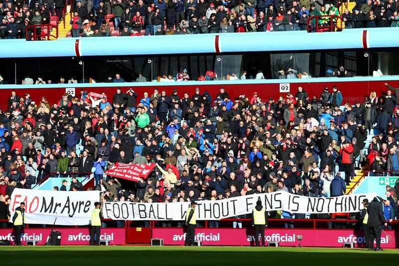 Liverpool fans unfurl a banner with a message directed at the club's chief executive, Ian Ayre, in protest against ticket prices before the Barclays Premier League match between Aston Villa and Liverpool at Villa Park on February 14, 2016 in Birmingham, England. Michael Steele / Getty Images