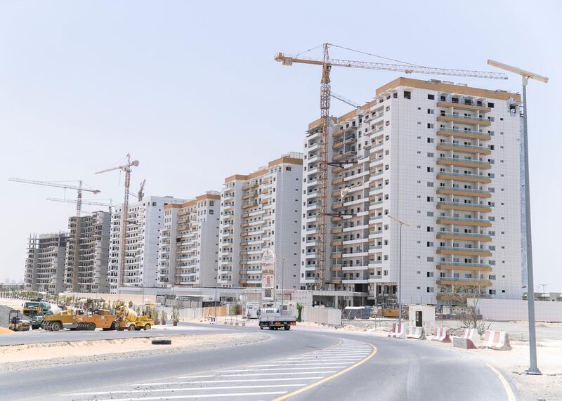 DUBAI, UNITED ARAB EMIRATES - JULY 15 2019.

The entrance road to Living Legends still under construction.

Some residents and investors of Living Legends have paid Dh6m for villas, and pay Dh25,000 a year in service charges but the development still looks like a construction site, with an unfinished golf course, roads, open sewer works near the school, poor lighting and no desert boundary meaning dangerous snakes and animals are regularly getting into the gardens and villas. 

(Photo by Reem Mohammed/The National)

Reporter: NICK WEBSTER
Section: NA