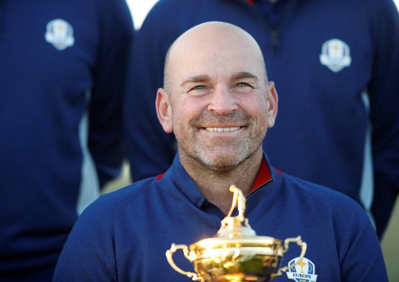 Team Europe captain Thomas Bjorn during the team photo with the Ryder Cup.  Paul Childs / Reuters