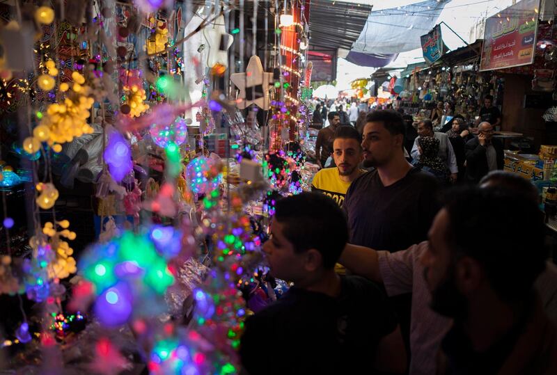 Palestinians shop in the Zawiya market ahead of Ramadan, in Gaza City.  AP Photo