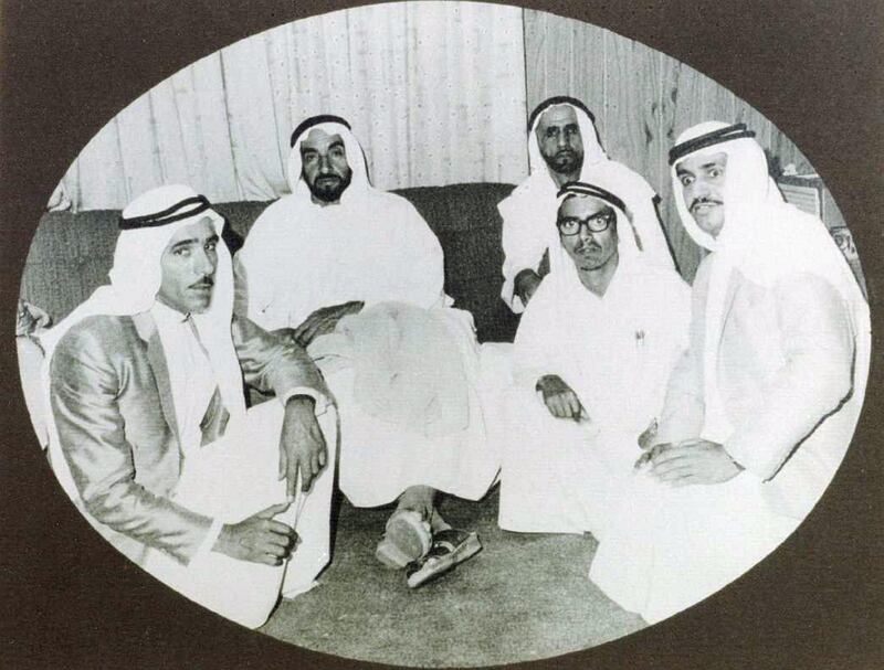 The men graduated in 1969 with degrees in agricultural engineering and returned to Abu Dhabi, where they were congratulated by Sheikh Zayed, seen here with his adviser Thani bin Morshid Al Romaithi (back right), in their project office on Saadiyat Island. Front row from left, Mohammed Mjrin Al Romaithi. Hamad Al Mazrouie and Abdullah Kaddas Al Romaithi. Courtesy Ali Kaddas Al Romaithi