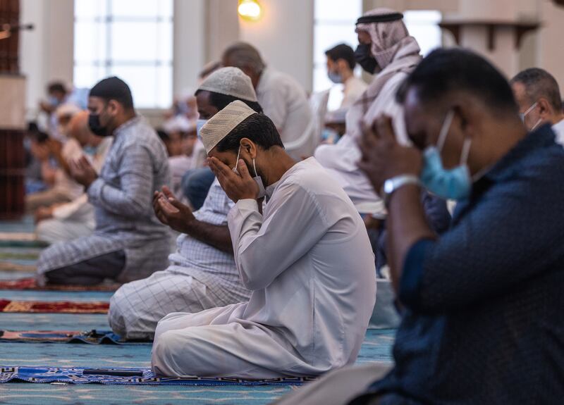 The faithful wear masks as a precaution against Covid-19 at Sheikh Hazza Bin Sultan Mosque on Electra Street in Abu Dhabi.