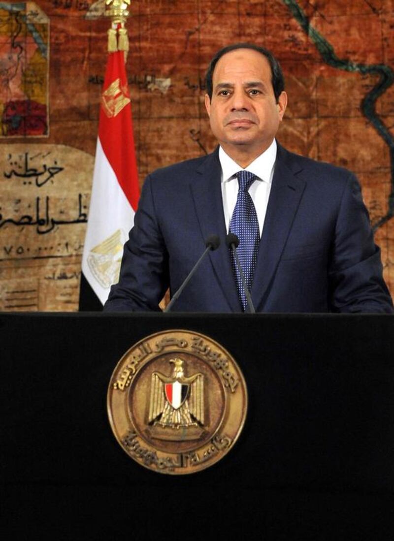 Egypt’s president Abdel Fattah El Sisi addresses the country on the first anniversary of mass protests that led to the removal of his predecesor. Egyptian Presidency / AFP / June 30, 2014