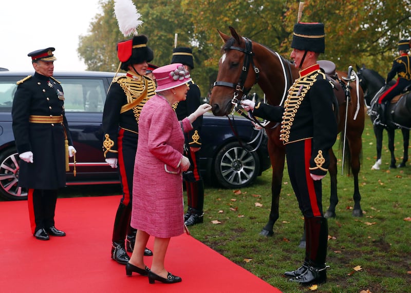 Queen Elizabeth II meets her racehorse Knock Castle as she attends the King's Troop, Royal Horse Artillery, during their 70th-anniversary parade, at Hyde Park on October 19, 2017 in London, England. Getty Images