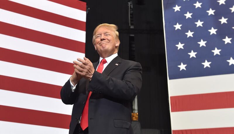 TOPSHOT - US President Donald Trump addresses a rally at the Nashville Municipal Auditorium in Nashville, Tennessee, May 29, 2018    / AFP / Nicholas Kamm
