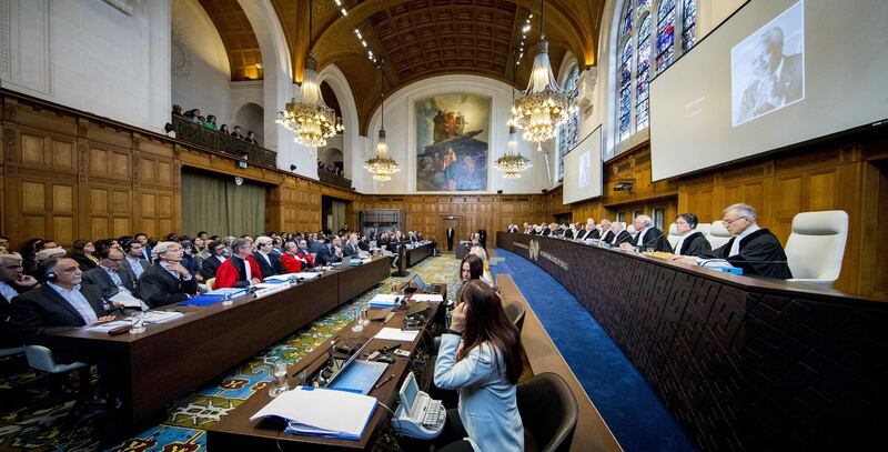 epaselect epa06975986 A remembrance for Kofi Annan, former Secretary-General of the United Nations (UN), who passed away on 18 August 2018, during the opening of case between Iran and the United States at the The International Court of Justice (ICJ) in the Hague, the Netherlands, 27 August 2018. Iran opened on 27 August, a lawsuit against renewed sanctions imposed by US President Donald J. Trump, demanding the ICJ to order their suspension on the grounds that these are damaging its economy, media reported.  EPA/JERRY LAMPEN