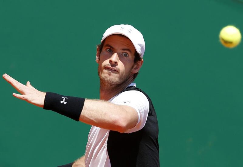 Andy Murray of Great Britain returns the ball to Rafael Nadal of Spain  during their semi final match at the Monte-Carlo Masters tournament in Monaco, 16 April 2016. EPA/SEBASTIEN NOGIER