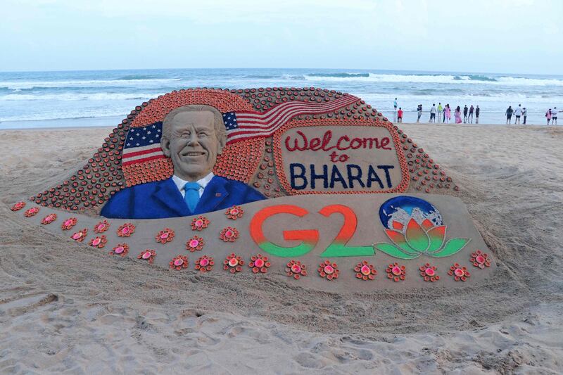 A sand sculpture created by Indian sand artist Sudarsan Pattnaik representing US President Joe Biden's visit to India for the two-day G20 summit is pictured at Puri beach in India's Odisha state.  AFP
