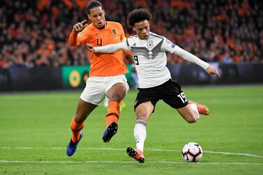 Soccer Football - Euro 2020 Qualifier - Group C - Netherlands v Germany - Johan Cruijff ArenA, Amsterdam, Netherlands - March 24, 2019 Netherlands' Virgil van Dijk in action with Germany's Leroy Sane REUTERS/Piroschka Van De Wouw