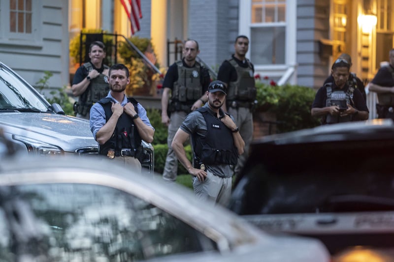 Police guard Mr Kavanaugh's home in Maryland. AFP
