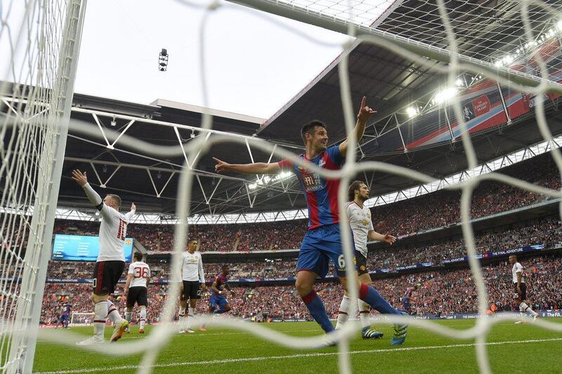 Scott Dann of Crystal Palace (6) celebrates as Jason Puncheon of Crystal Palace scores their first goal during the FA Cup Final match between Manchester United and Crystal Palace at Wembley Stadium on May 21, 2016 in London, England. (Mike Hewitt/Getty Images)