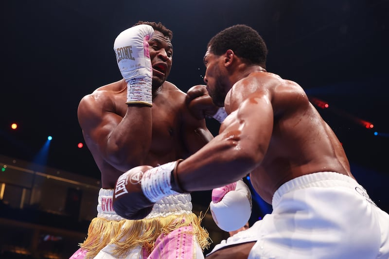 Anthony Joshua throws punches at Francis Ngannou during their heavyweight bout. Getty Images