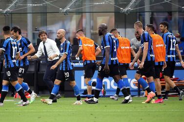 Inter Milan manager Antonio Conte with his players during the 3-3 draw against Sassuolo. EPA